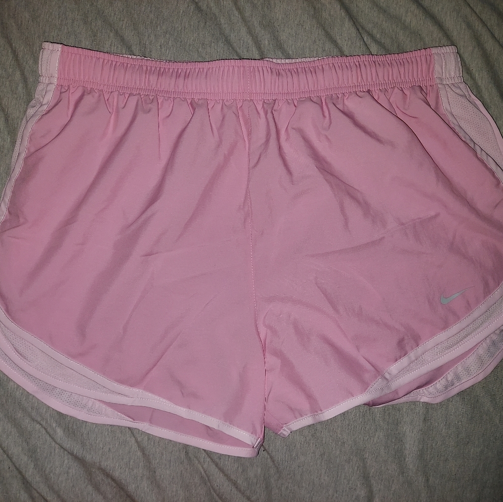 Pink Nike running shorts